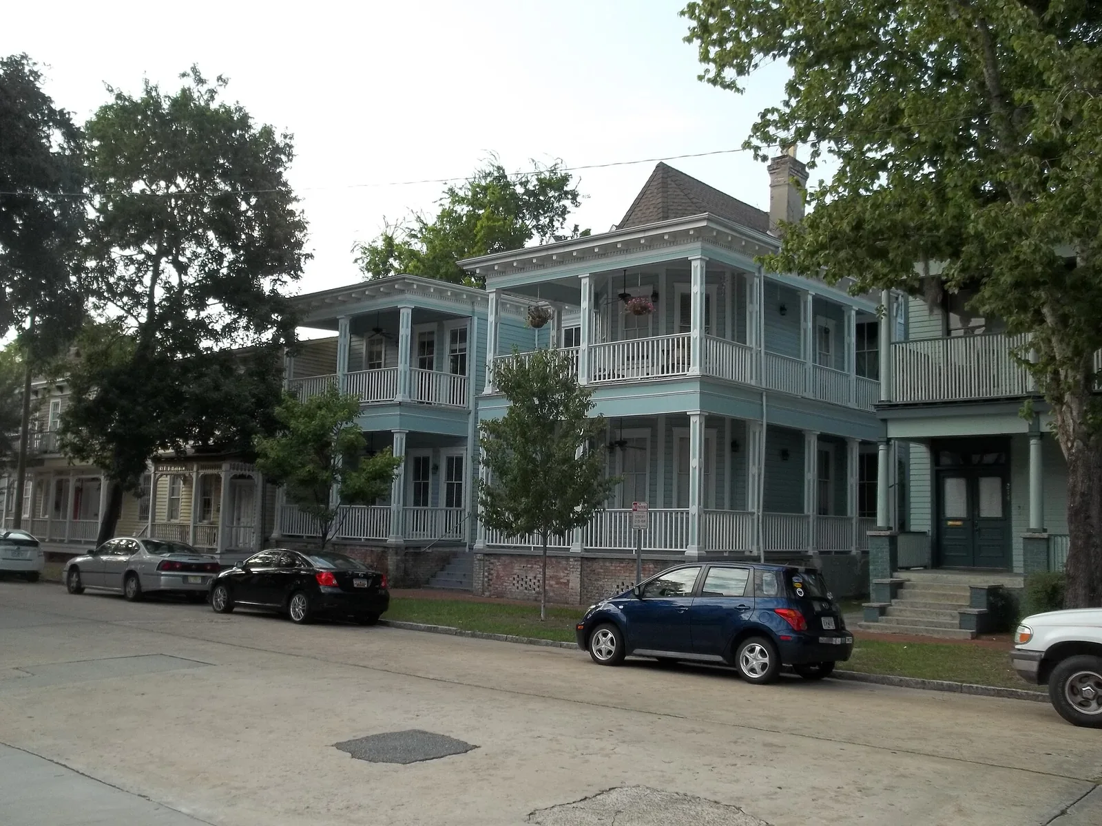 Wood-frame houses with two-story porches in Savannah's Victorian District