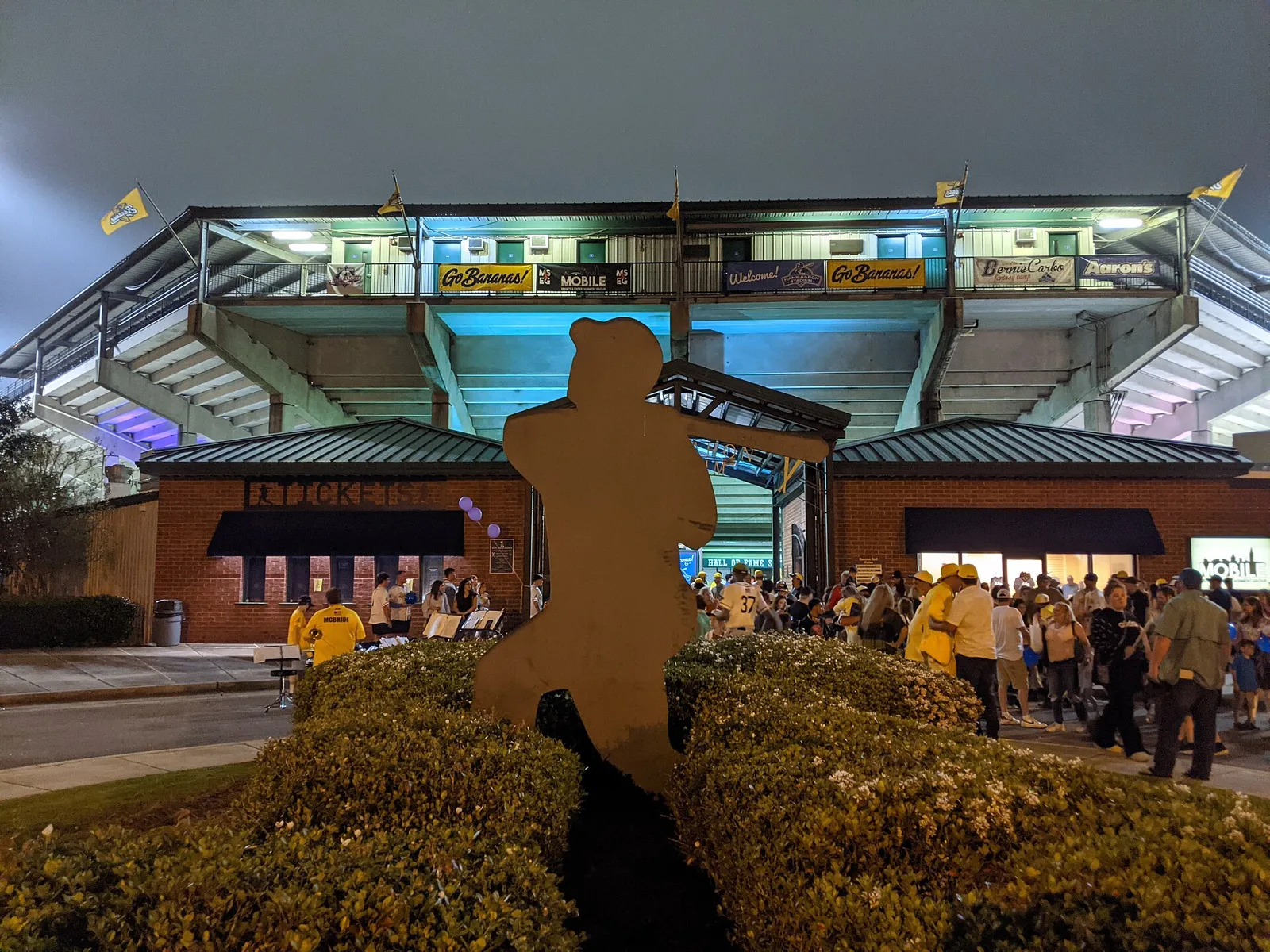Fans gather outside the Grayson Stadium ticket office on a Savannah Bananas game night.