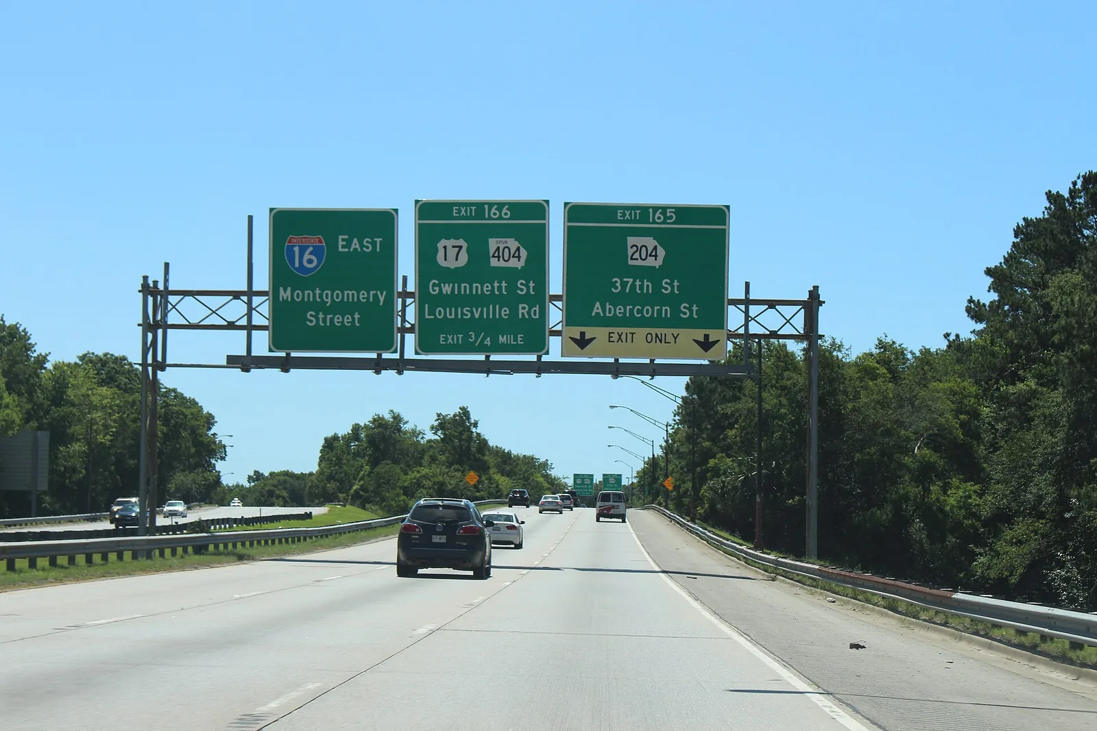The Interstate 16 sign for Exit 166, less than half a mile from Butler Elementary