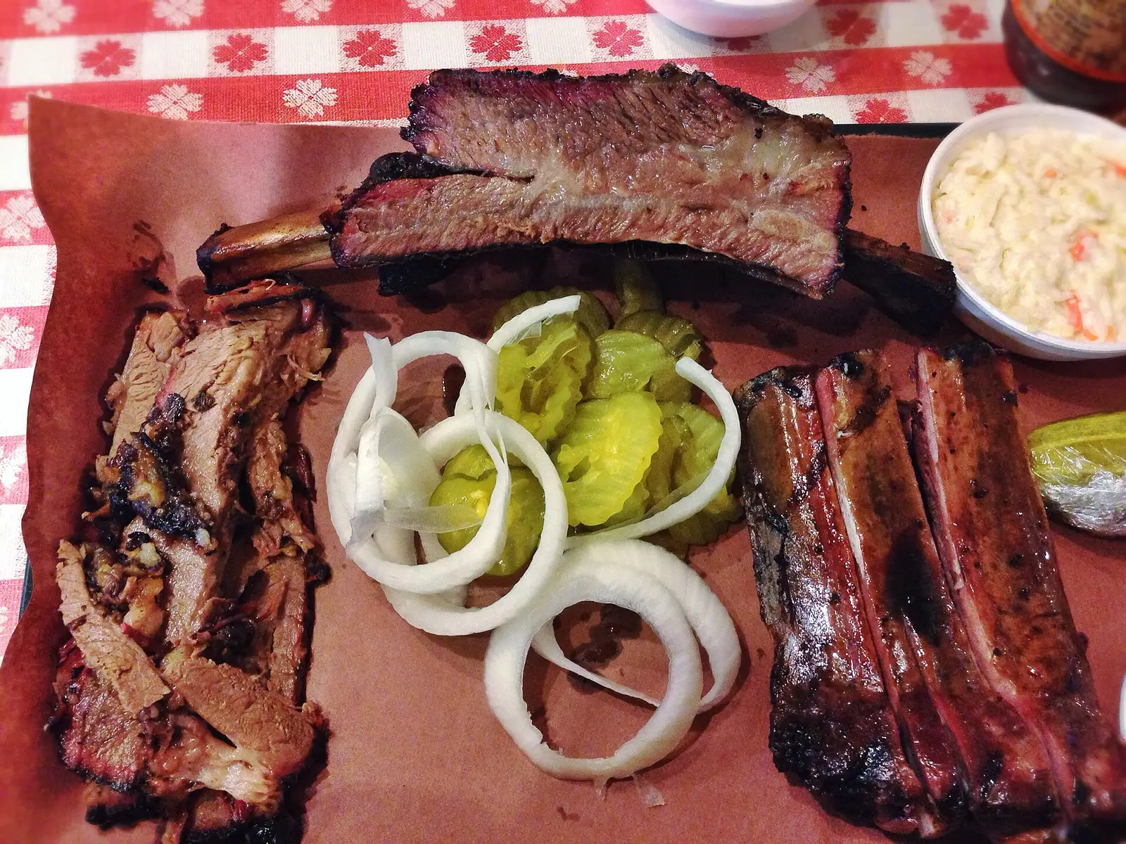 A barbecue plate of brisket, beef rib and pork ribs. The photo was not taken at a Savannah restaurant.
